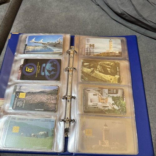 Album with 50 various phone cards like new