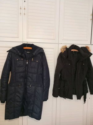 Two outerwear pieces like new, blue waterproof quilted and black H &M with fur, size L
