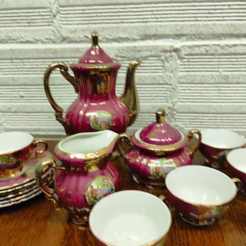 Porcelain coffee set used, 15 pieces, burgundy-fuchsia with gold details