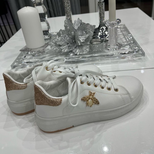 Women's athletic shoes used, white with gold details, size 39