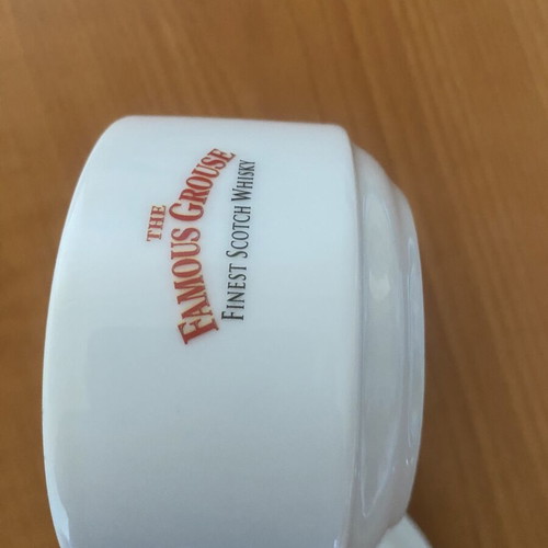 Vintage ceramic ashtray with The Famous Grouse whisky logo, like new