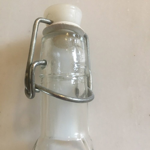 Small glass bottle with airtight seal like new