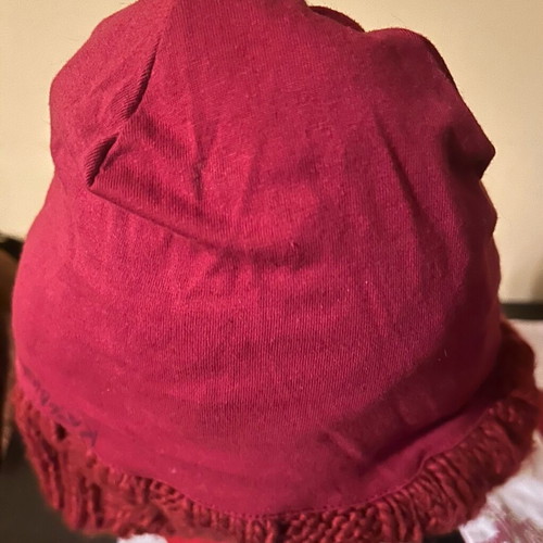 Knitted hat used, burgundy Zara with two pom-poms