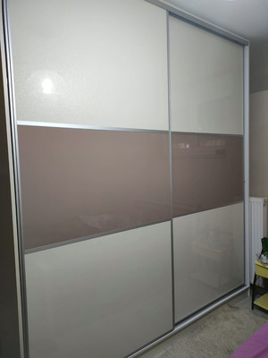 Wardrobe used, lacquered, 2.40m length x 2.80m height