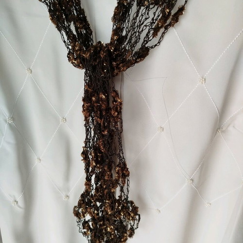 Crocheted spring scarf new, brown gold