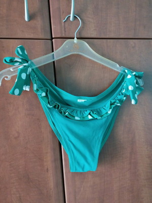 Women's bikini bottom used green with white polka dots