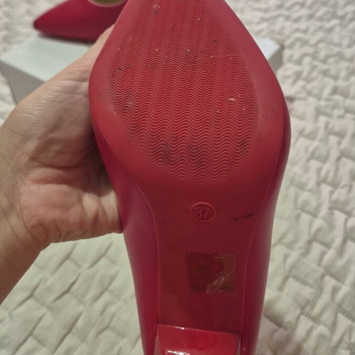 Red high heel pumps