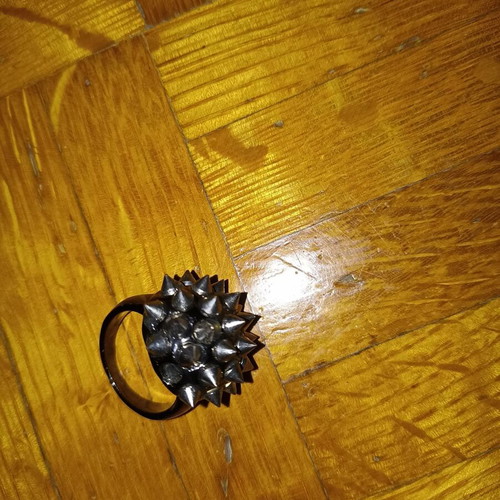 Unisex ring used dark gray with silver spikes