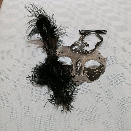 Venetian-style mask with feathers like new