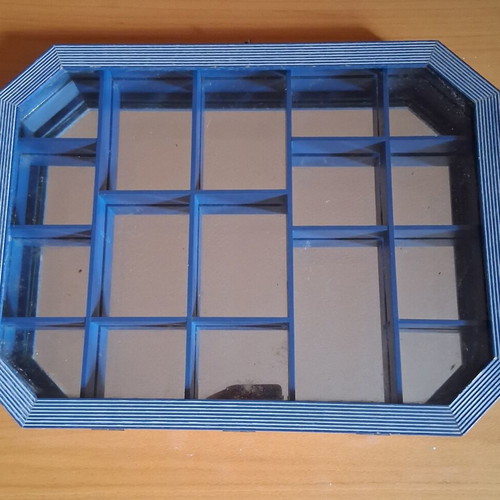 Display case for miniatures, hanging with mirror