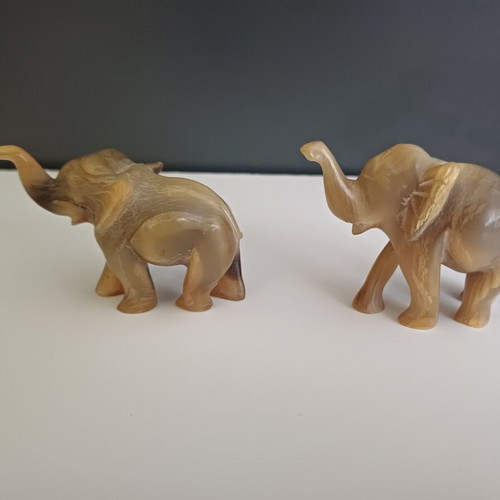 Carved elephant figurines used, set of two, missing tusks