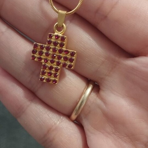 Necklace with gold color cross pendant and red rhinestones like new