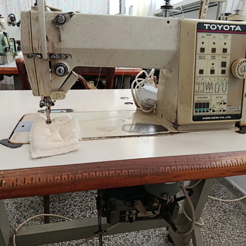 Toyota AD1013-F8 Aisin Seiki industrial sewing machine with electronic control panel