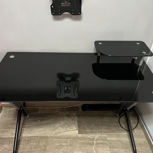 Glass desk used with metal frame, modern design