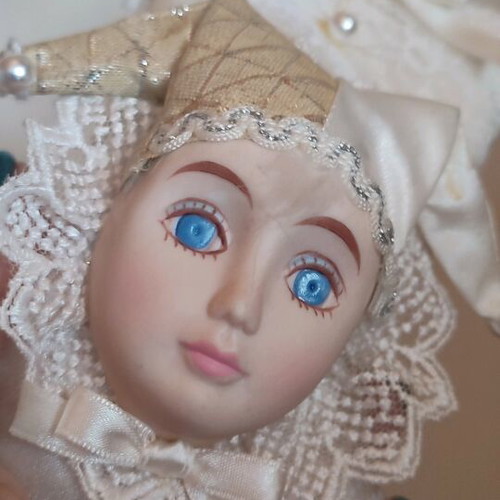 Christmas ornament with harlequin on stocking like new