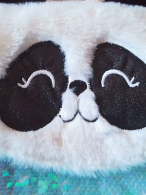 Plush kids backpack panda with sequins used