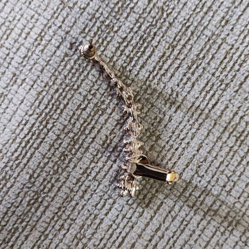 Earring like new, gold color with rhinestones