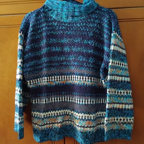 Knitted turtleneck sweater used, blue with multicolor pattern, size L