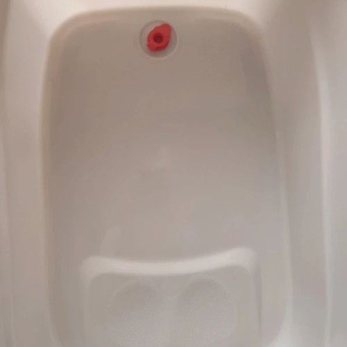 Baby Bathtub like new, beige with anti-slip surface and drain plug