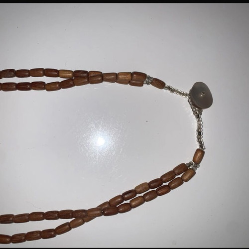 Set of 3 wooden necklaces, brown tones