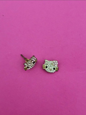 Hello Kitty stud earrings like new, hypoallergenic steel with diamond simulants