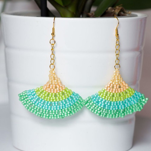 Handmade earrings with green and orange glass beads
