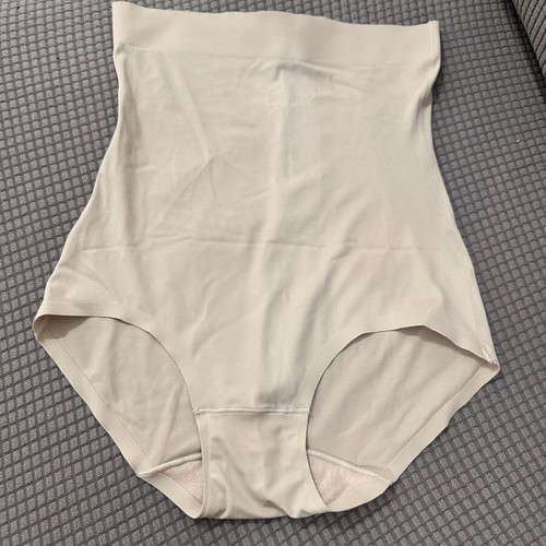 High-waisted nude seamless shapewear slip, size M