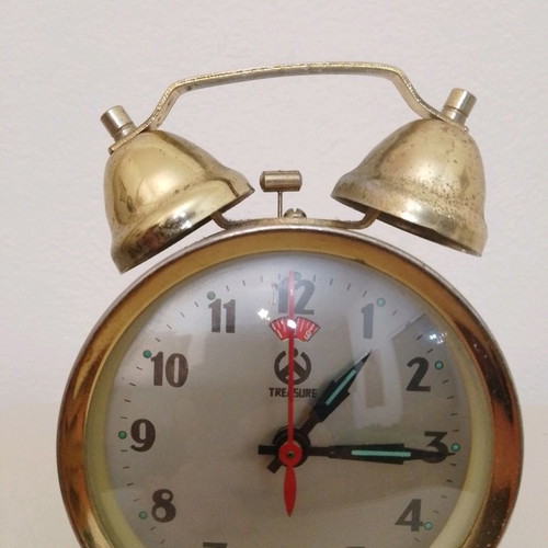 Treasure wind-up alarm clock vintage, used