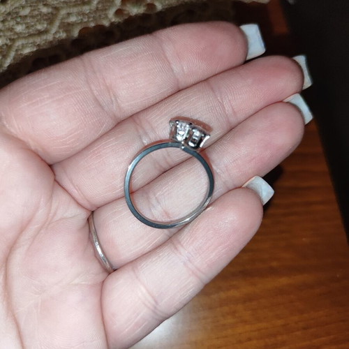 Rings set like new, silver, includes solitaire and two-stone ring size 18.5