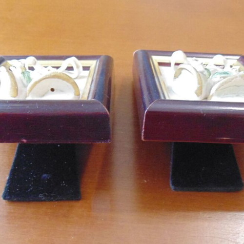 Pair of small frames used with handmade embossed porcelain bells and flowers