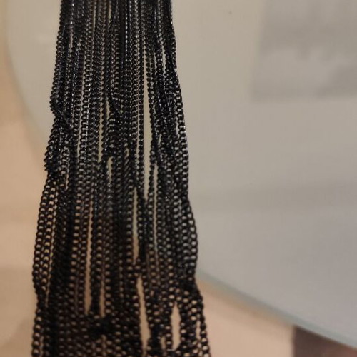 Long gold necklace with black chains new, heavy piece