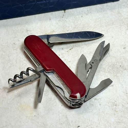 Vintage Swiss Army Pocket Multitool with Scissors and Corkscrew used