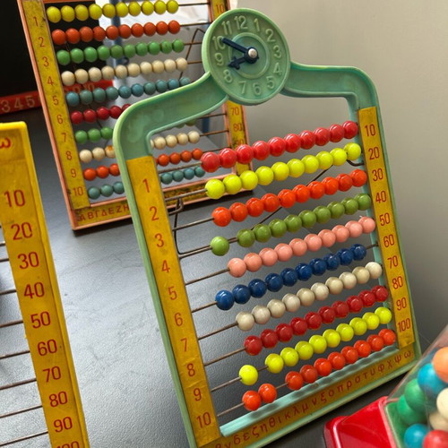 Vintage toys used, 1970s abacus counters, plastic phone