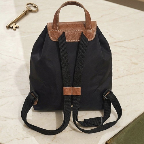 Smart foldable backpack like new, black with brown details