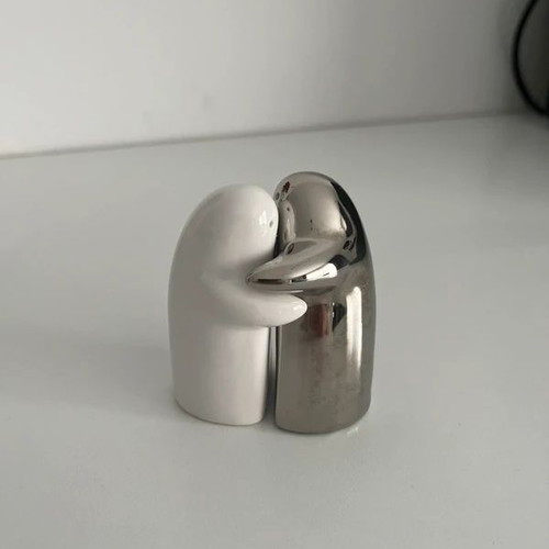 Porcelain hugging ghost salt and pepper shakers like new