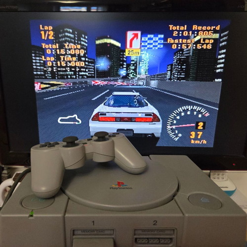 Sony PlayStation SCPH-7502 PS1 console used with Dualshock controller