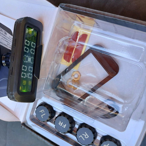 Wireless tire pressure and temperature monitoring system new