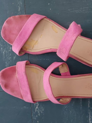 For sale: a pair of low pink sandals