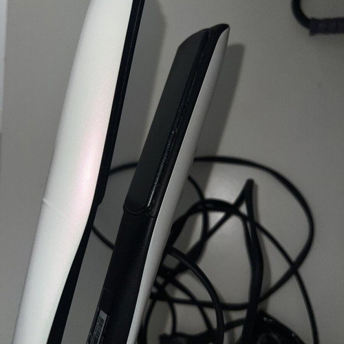 GHD Platinum+ hair straightener used for parts or repair