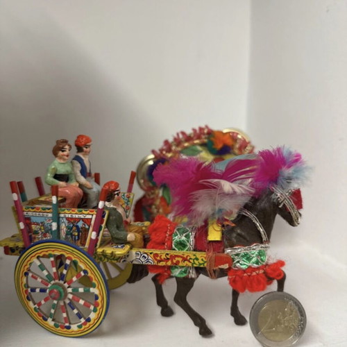 Vintage Sicilian cart with horse and tambourine decoration
