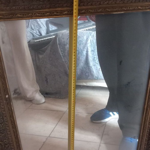 Mirror with wooden gold carved frame used, with damages