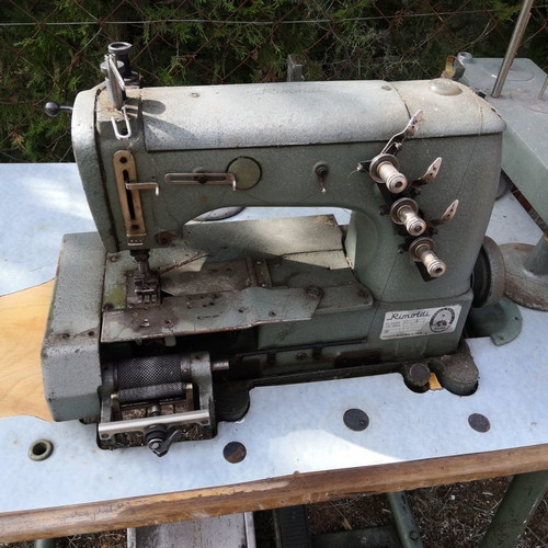 Sewing machines used with complete table