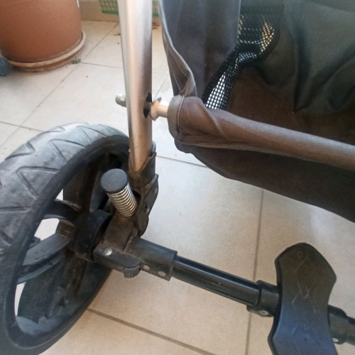 Multifunctional stroller used, foldable in two parts, beige brown gold