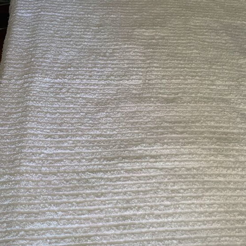 Cotton quilt for large bed, pale pink, striped with fringes