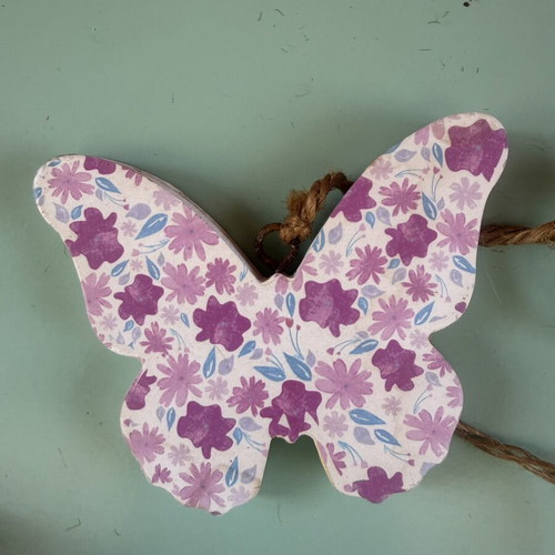 Handmade hanging decoration with butterfly, heart and flower wooden motifs