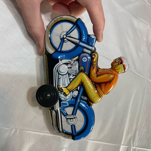 Motorcyclist vintage tin toy made in West Germany like new
