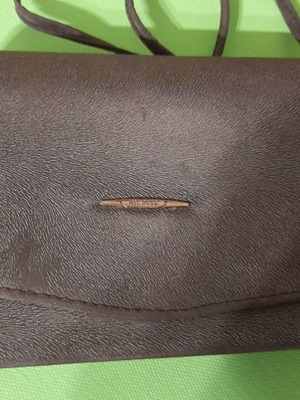 Small gray shoulder bag used