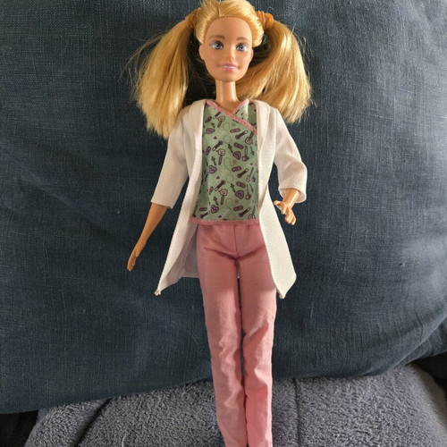 Barbie nurse used with clothes and extra nurse robe