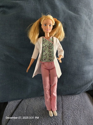 Barbie nurse used with clothes and extra nurse robe