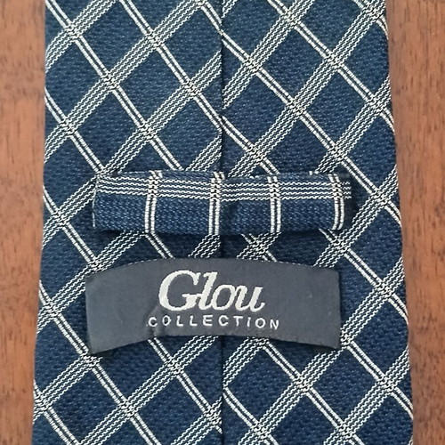 Glou silk tie like new, handmade, blue and beige checkered